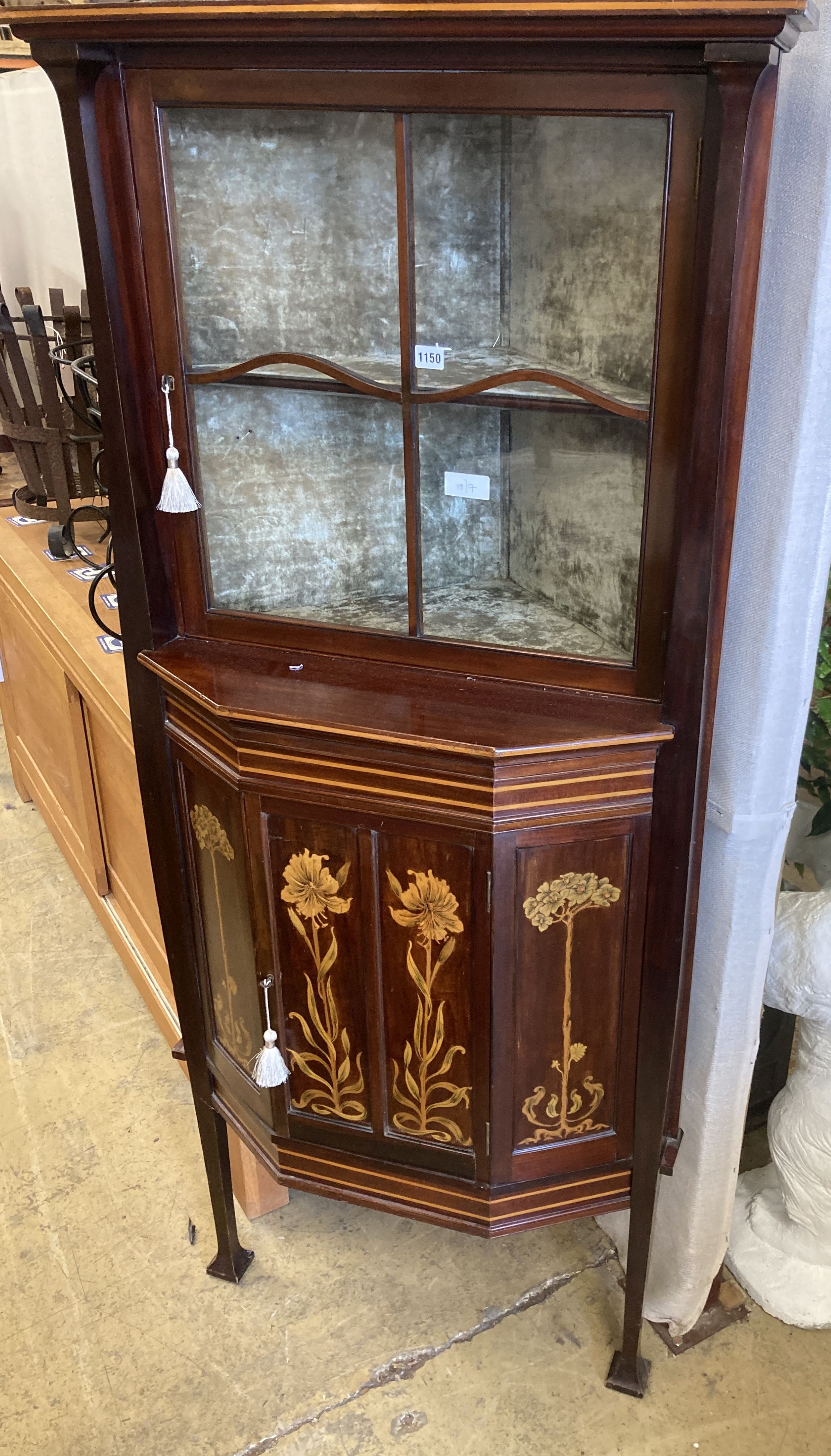 A late Victorian Art Nouveau marquetry inlaid and cross banded mahogany standing corner cabinet, width 74cm, depth 53cm, height 173cm